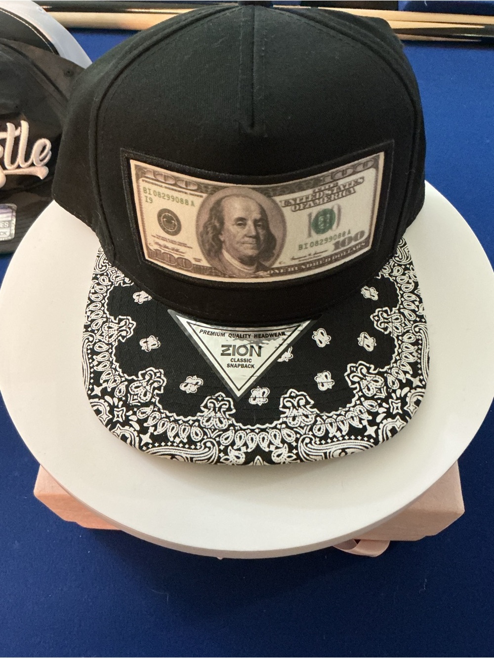 Zion Rootswear Black Snapback Hat with Paisley Brim and Money Patch